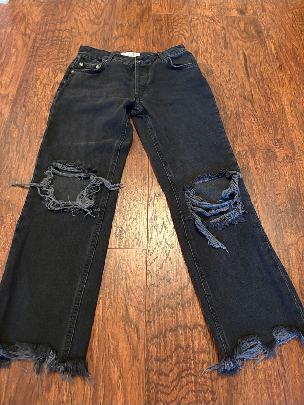 We The Free black distressed jeans